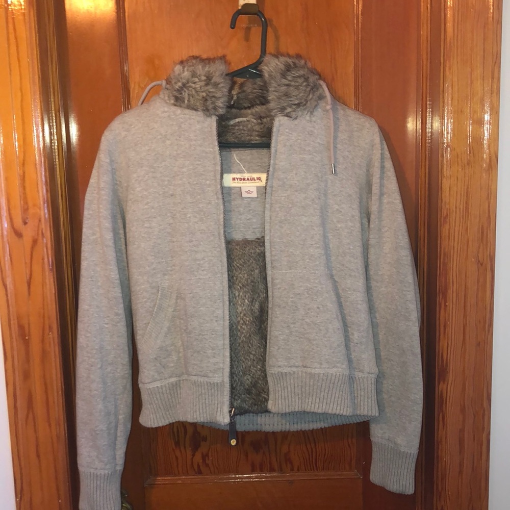 Gray sweatshirt.